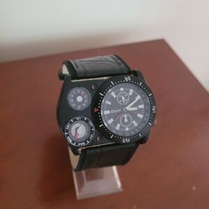 New black face Oulm watch with thermometer and compass